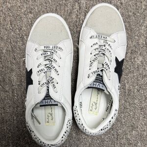 White Sneakers with Black Star Detail